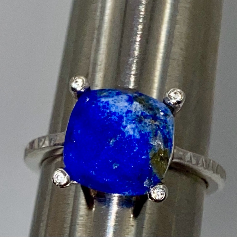 Lapis gemstone set in sterling silver with CZ accents.